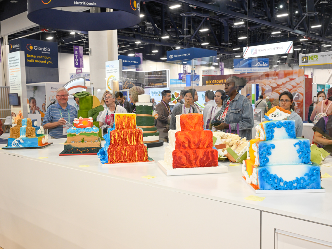 Display table of cakes at the Pillsbury Bakers' Plus Creative Cake Decorating Competition