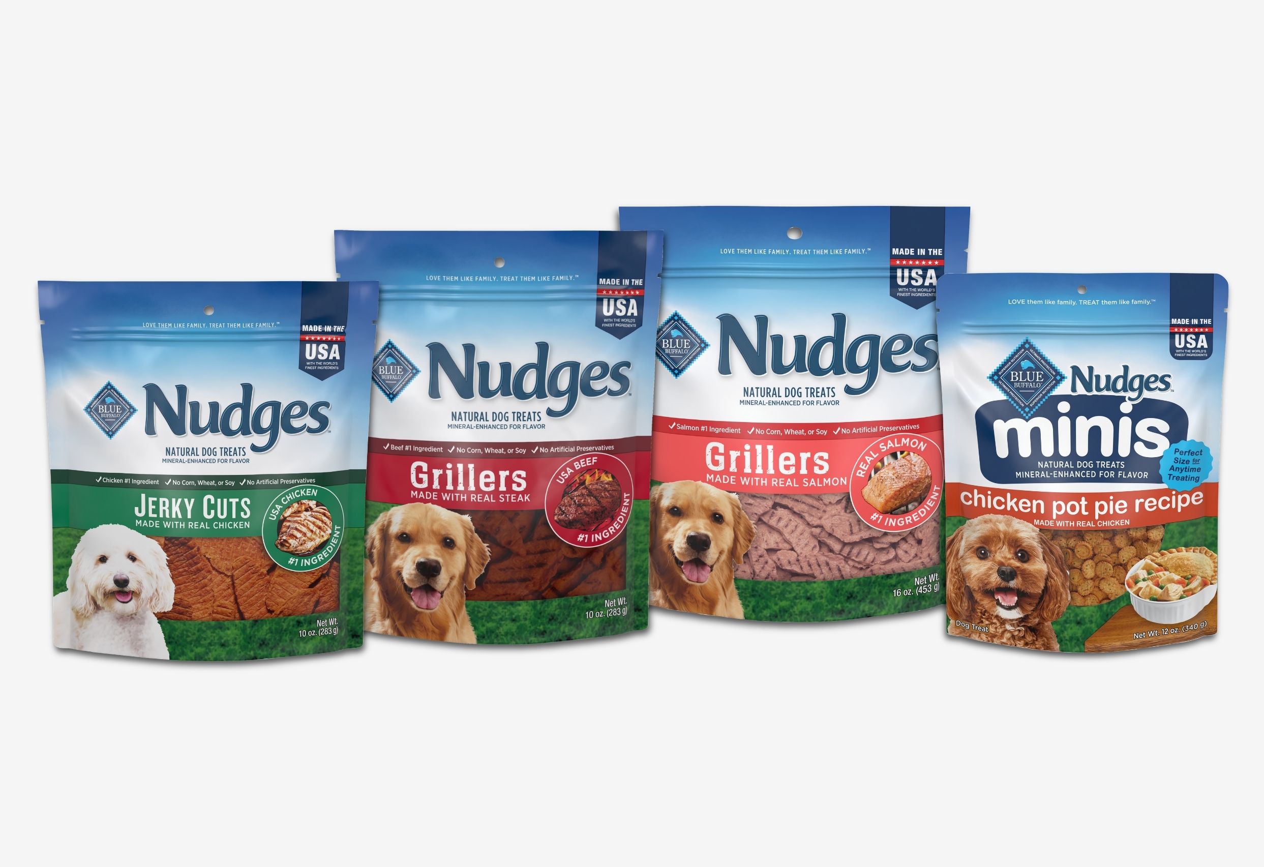 A collection of four pouches of Blue Buffalo Nudges natural dog treats. 