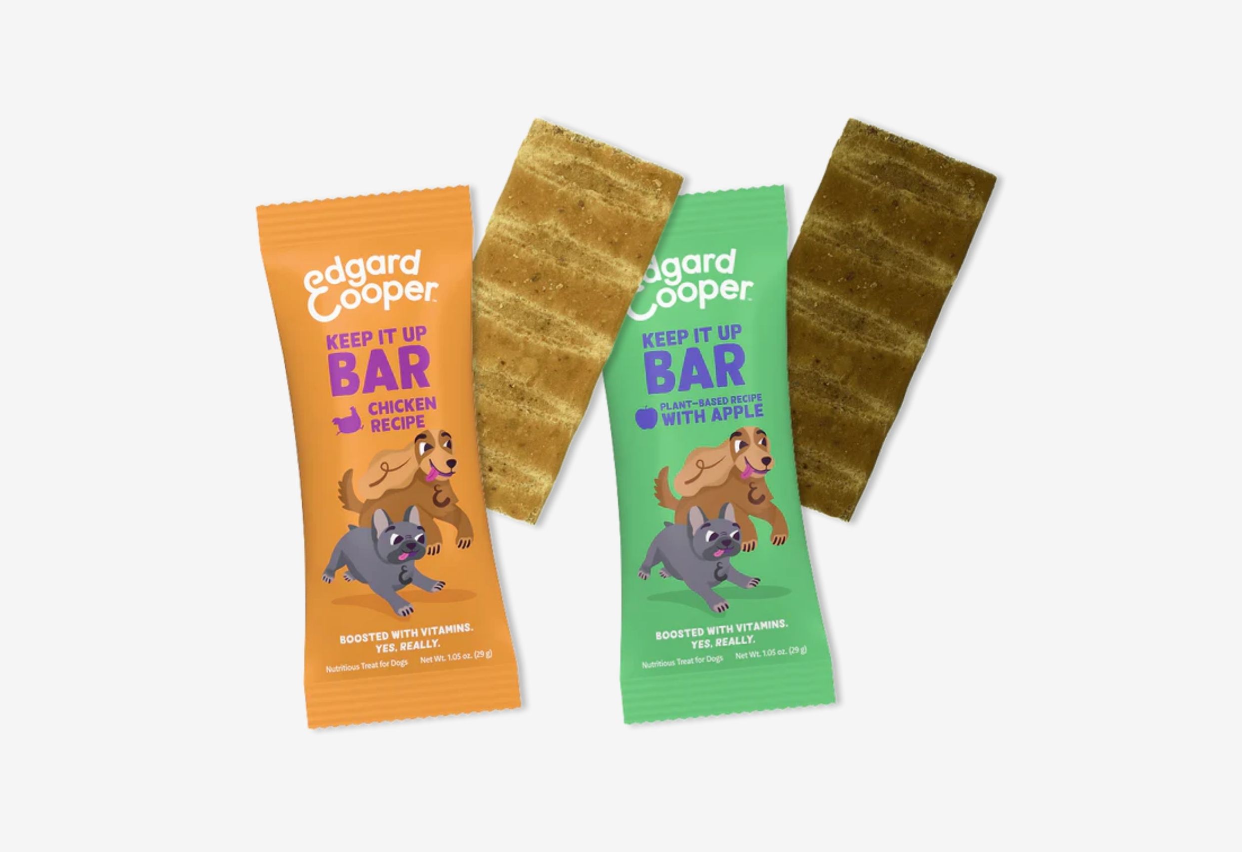 Two Edgard & Cooper "Keep It Up Bar" dog treats. The orange wrapper is for the Chicken Recipe and the green wrapper is for the Apple Plant-Based Recipe.